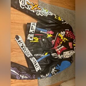 Used leather jacket (rip under left armpit as shown in photo)